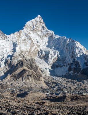 landscape-shot-beautiful-valley-surrounded-by-huge-mountains-with-snowy-peaks